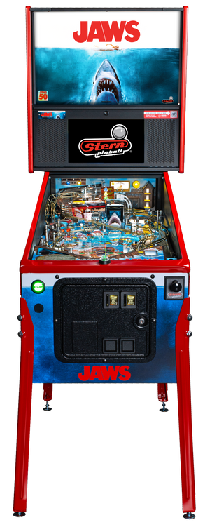 Pinball machine themed after the movie 'Jaws' with a shark graphic on the screen.